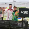 DJ Kev DJing outdoors at the Logan Circle District Bridges World Cup Festival